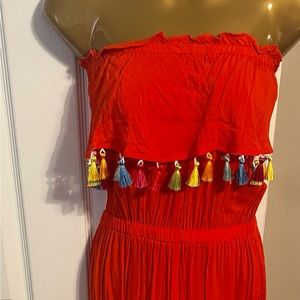 Festive red cover-up with multi color tassels